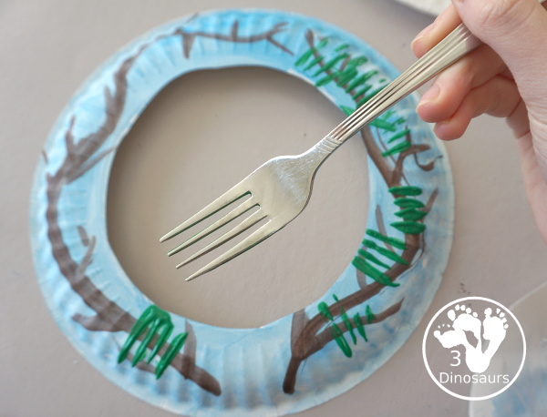 Winter Evergreen Wreath Craft - a fun wreath craft with a evergreen tree in winter with berries and snow. - 3Dinosaurs.com