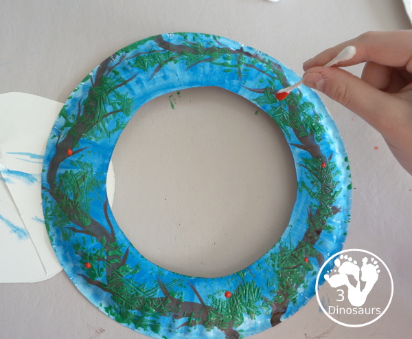 Winter Evergreen Wreath Craft - a fun wreath craft with a evergreen tree in winter with berries and snow. - 3Dinosaurs.com