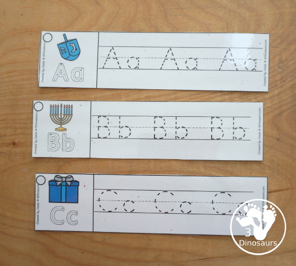 Free Hanukkah ABC Tracing Strip Printables - with uppercase and lowercase together. You have fun kids with Hanukkah items plus you can see an example of how to trace the letters - 3Dinosaurs.com