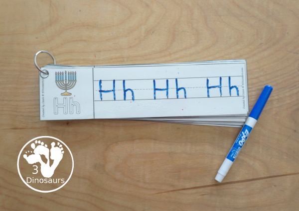 Free Hanukkah ABC Tracing Strip Printables - with uppercase and lowercase together. You have fun kids with Hanukkah items plus you can see an example of how to trace the letters - 3Dinosaurs.com