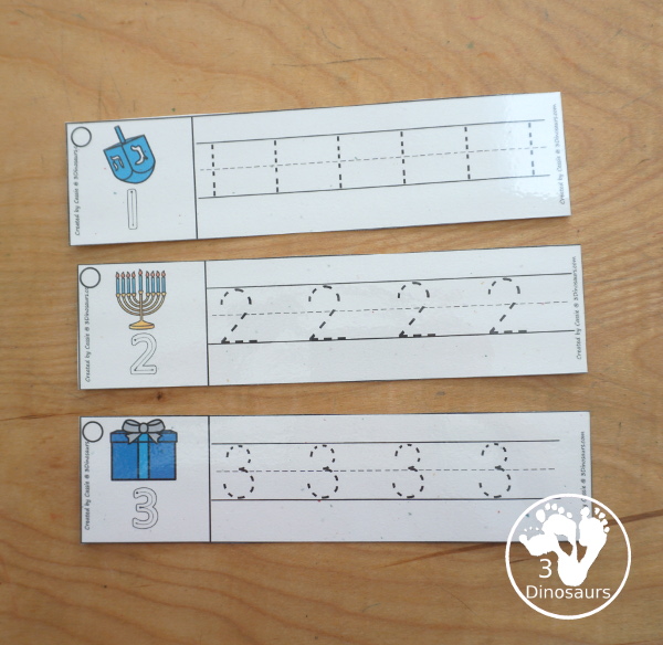 Free Hanukkah Number Tracing Strips - with numbers 0 to 20. You can trace the numbers and an example of how to trace the numbers on the strips, plus Hanukkah items on each tracing strip. - 3Dinosaurs.com