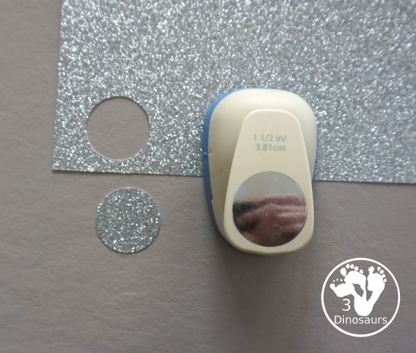 New Years Glitter Ball Craft - made with a paper plate, dot marker, glue nad glitter cardstock. A great New Years Eve craft for kids.- 3Dinosaurs.com