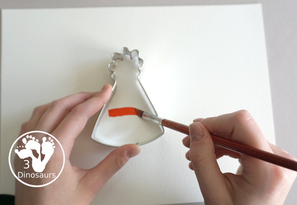 Party Watercolor Painting with Cookie Cutters - a simple cookie cutter painting with party themed cookie cutters that is great for a party and also New years - 3Dinosaurs.com