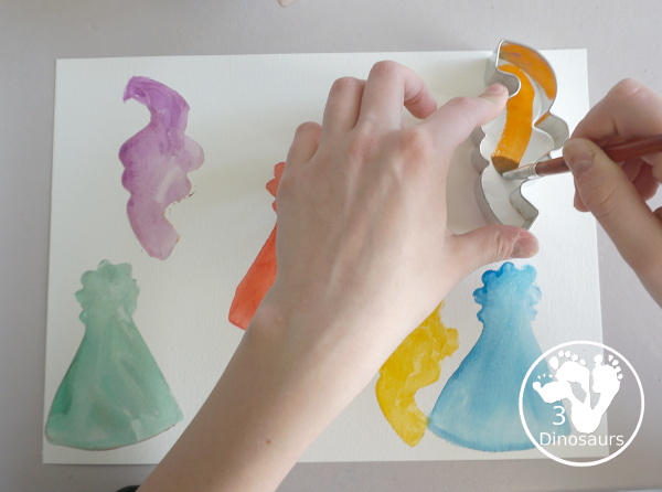 Party Watercolor Painting with Cookie Cutters - a simple cookie cutter painting with party themed cookie cutters that is great for a party and also New years - 3Dinosaurs.com