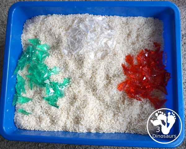 Christmas Tree Sensory Bin - a simple Christmas sensory bin with rice and acrylic Christmas trees. Simple and easy to set up and use. - 3Dinosaurs.com