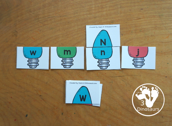 Free Christmas Lights ABC Matching Printable - a fun letter matching printable for kids with different colored Christmas lights. You match uppercase letters and lowercase letters- 3Dinosaurs.com