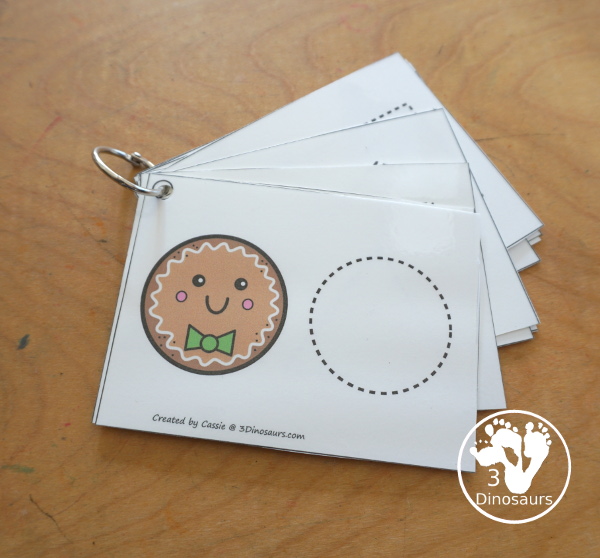 Free Gingerbread Shape Tracing Card Printable - has 12 shapes for kids to trace. You have a picture of the gingerbread man face with the shape, and then a shape to trace.  3Dinosaurs.com