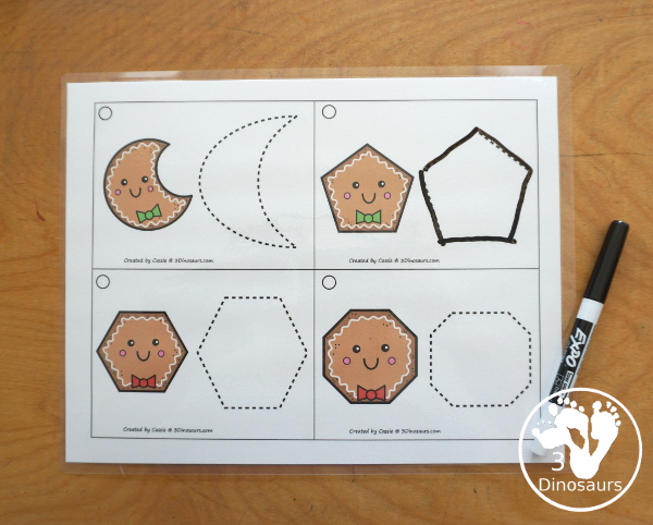 Free Gingerbread Shape Tracing Card Printable - has 12 shapes for kids to trace. You have a picture of the gingerbread man face with the shape, and then a shape to trace.  3Dinosaurs.com