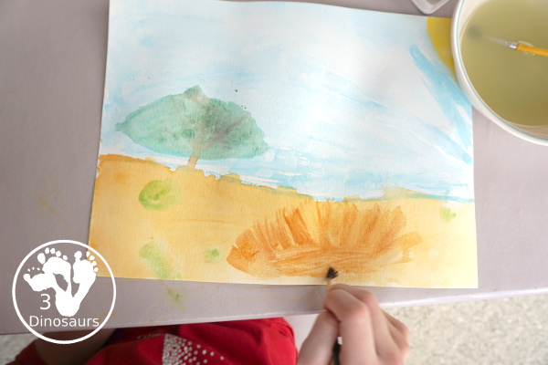 Giraffe & Lion Painting with Lions at Lunchtime - a fun watercolor and cookie cutter painting activity to make an African animal scene - 3Dinosaurs.com