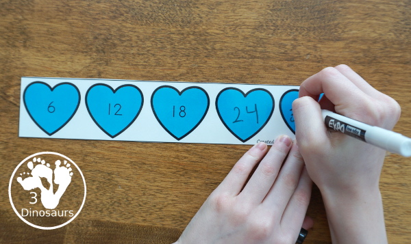 Free Heart Skip Counting Strips: 1 to 12 - how to use dry erase markers with the strips - 3Dinosaurs.com #skipcounting #freeprintable