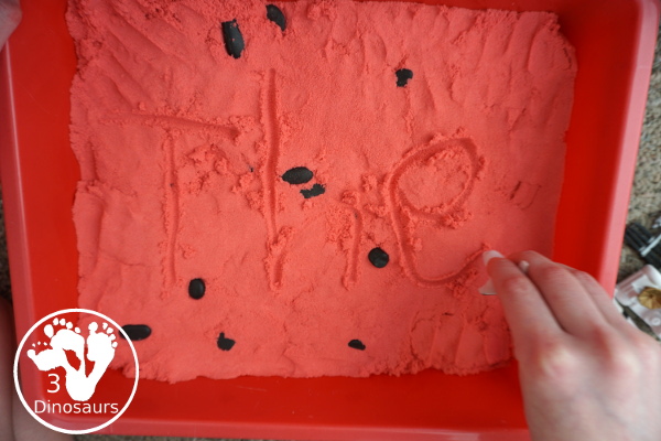 Mars Themed Sensory Bin with kinetic sand - a fun way to explore the red planet Mars -  3Dinosaurs.com