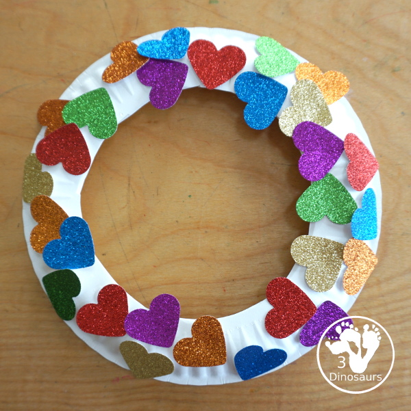 Rainbow Heart Wreath - made with glitter hearts and a paper plate that is super simple to put together for  heart theme of Valentines - 3Dinosaurs.com