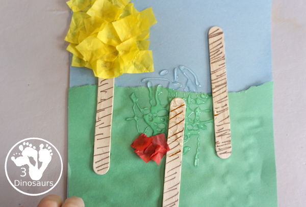 Tissue Paper Truffula Tree Craft you can make to go with the book the Lorax. It is simple for kids of different ages to make for a Dr Seuss Craft. - 3Dinosaurs.com