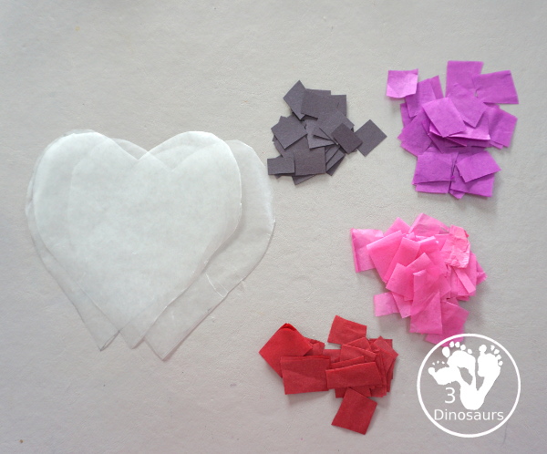 Stained Glass Hearts Craft For Valentine's Day - a simple wax paper craft for kids with tissue paper glue and tissue paper. - 3Dinosaurs.com