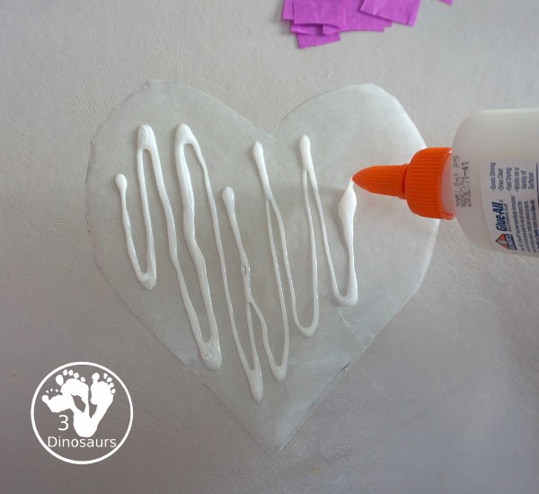 Stained Glass Hearts Craft For Valentine's Day - a simple wax paper craft for kids with tissue paper glue and tissue paper. - 3Dinosaurs.com