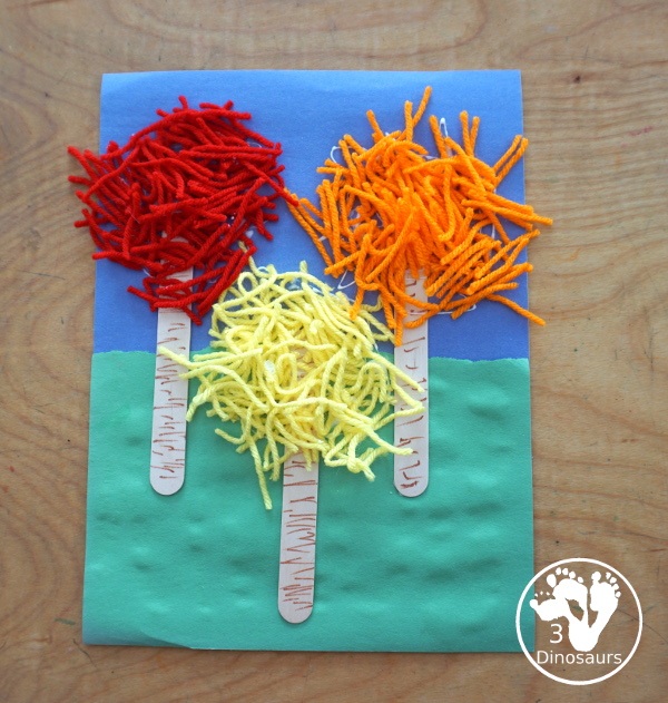 Yarn Truffula Trees - a fun and easy craft for the book The Lorax and Earth Day. You use paper, craft sticks and yarn to make the truffula trees.  3Dinosaurs.com