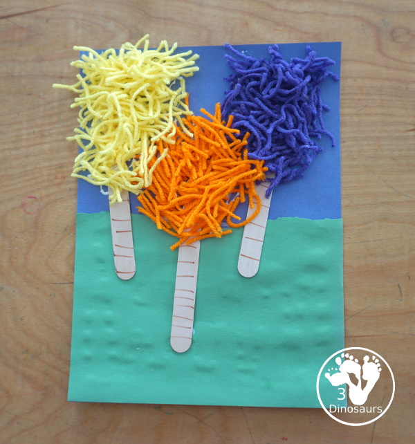 Yarn Truffula Trees - a fun and easy craft for the book The Lorax and Earth Day. You use paper, craft sticks and yarn to make the truffula trees.  3Dinosaurs.com