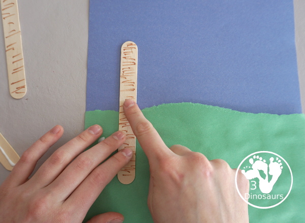 Yarn Truffula Trees - a fun and easy craft for the book The Lorax and Earth Day. You use paper, craft sticks and yarn to make the truffula trees.  3Dinosaurs.com