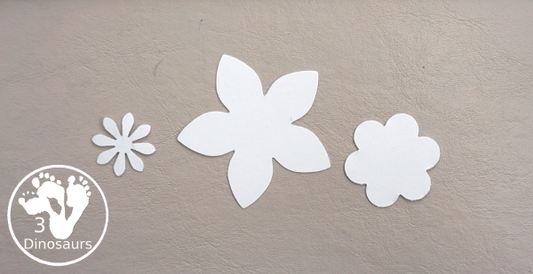 Flower Themed Paper Plate Wreath: Oil Pastels - fun and easy wreaths to make at any time using flower punches and paper plates - 3Dinosaurs.com