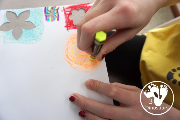 Flower Themed Paper Plate Wreath: Oil Pastels - fun and easy wreaths to make at any time using flower punches and paper plates - 3Dinosaurs.com