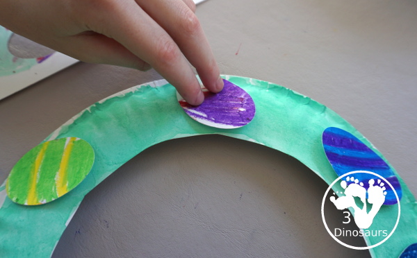 Easy to Make Easter Egg Wreath - a fun wreath for Easter that kids will just love to make - 3Dinosaurs.com