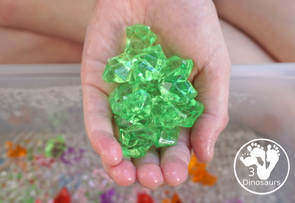 Rainbow Colors Water Bead Sensory Bin - a great sensory bin exploring colors through clear waterbeads a fun sensory play for kids to do. - 3Dinosaurs.com