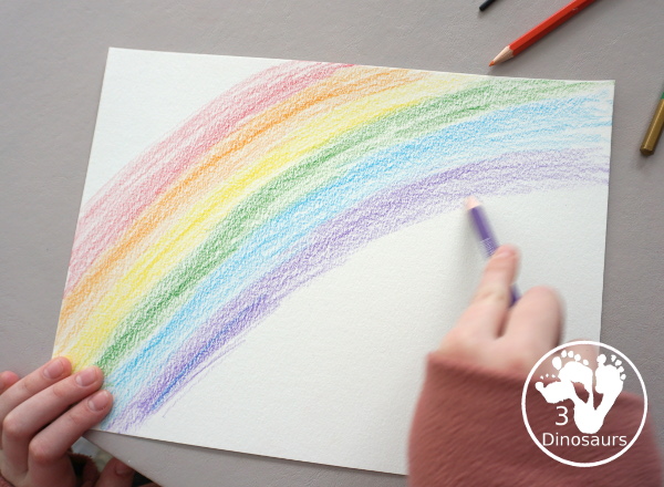 Rainbow Watercolor Pencil Painting - this is a great way to change up coloring and painting activities and watch how the pencil coloring mixes on the paper and makes a great watercolor painting  - 3Dinosaurs.com