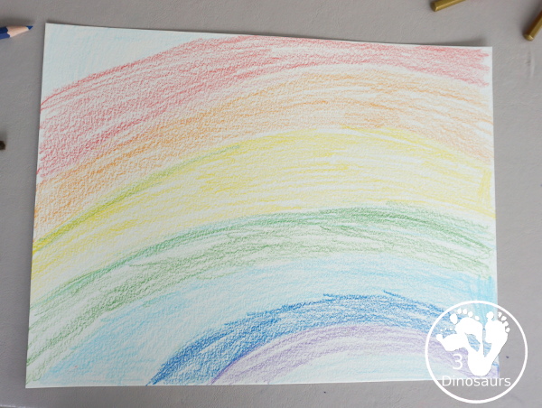Rainbow Watercolor Pencil Painting - this is a great way to change up coloring and painting activities and watch how the pencil coloring mixes on the paper and makes a great watercolor painting  - 3Dinosaurs.com