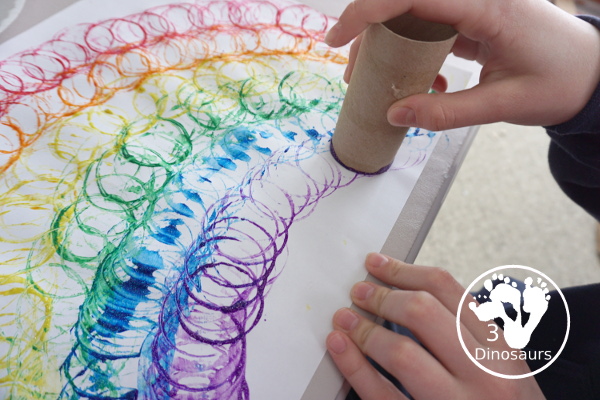 Paper Roll Rainbow Painting - a simple rainbow painted with paper rolls this is a great rainbow, spring and St. Patrick's Day craft - 3Dinosaurs.com