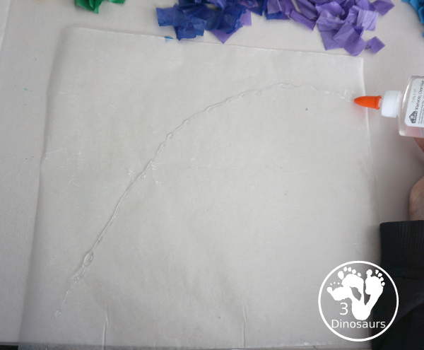Tissue Paper Rainbow - a great craft you can make to hang in a window or display in a room. A great spring fine motor craft for kids