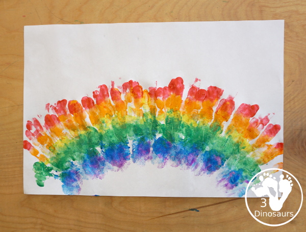 Hand Print Rainbow- you can make a rainbow with paint and a hand and it is fun for kids to make the rainbow. This is great for spring and St Patrick's day