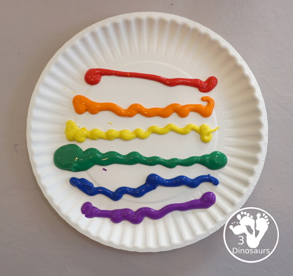 Hand Print Rainbow- you can make a rainbow with paint and a hand and it is fun for kids to make the rainbow. This is great for spring and St Patrick's day