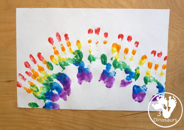 Hand Print Rainbow- you can make a rainbow with paint and a hand and it is fun for kids to make the rainbow. This is great for spring and St Patrick's day