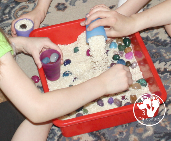 Rock & Rice Sensory Bin - play in the rock and rice sensory bin - 3Dinosaurs.com