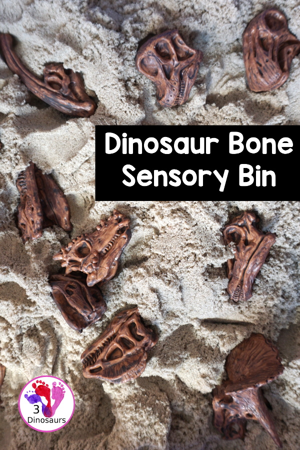 Dinosaur and Kinetic Sand Sensory Bin - a simple sensory bin put together to play with dinosaur bones and kinetic sand. Super simple to set up and use for sensory play.- 3Dinosaurs.com