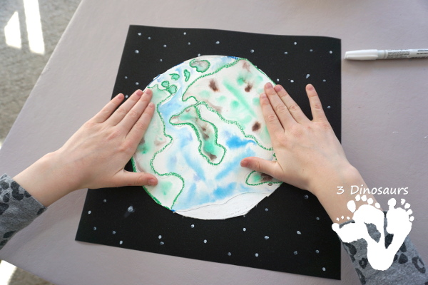 Watercolor Planet Earth Process Art - An easy and fun art project for planet Earth using watercolors and oil pastels - 3Dinosaurs.com