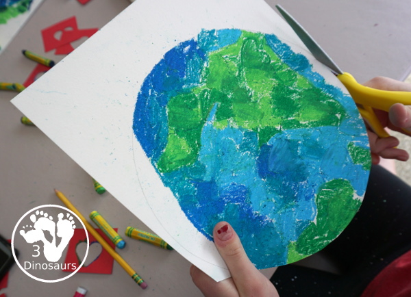 Oil Pastel Earth with Heart Shapes - a great craft that works on blending colors and making a very fun planet Earth for Earth Day - 3Dinosaurs.com
