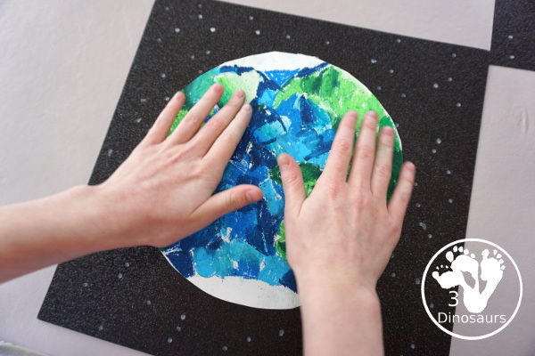Oil Pastel Earth with Heart Shapes - a great craft that works on blending colors and making a very fun planet Earth for Earth Day - 3Dinosaurs.com