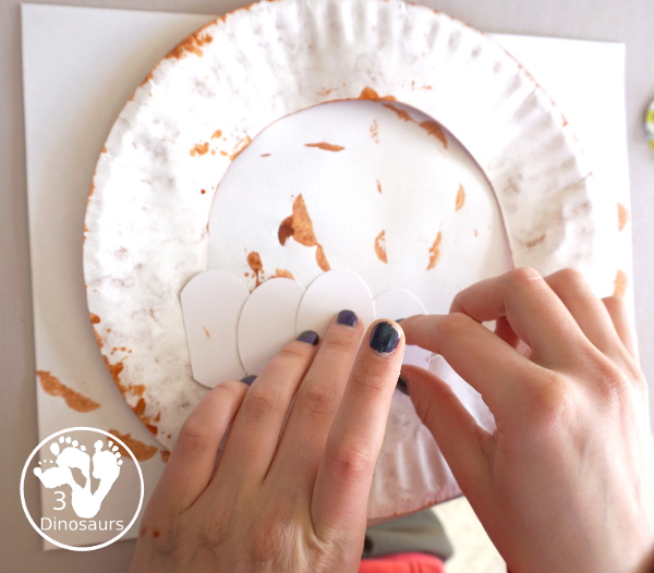 Easter Basket Craft for Kids - a simple paper plate Easter basket you can make with kids as a decoration for Easter - 3Dinosaurs.com