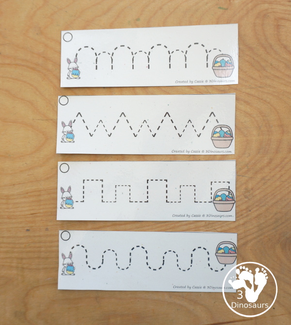 Free Easter Prewriting Strips - prewriting printable for kids working on more complex prewriting skills with prewriting fonts in repeat pattern and sizes. You have Easter Bunny getting to a basket of eggs. - 3Dinosaurs.com