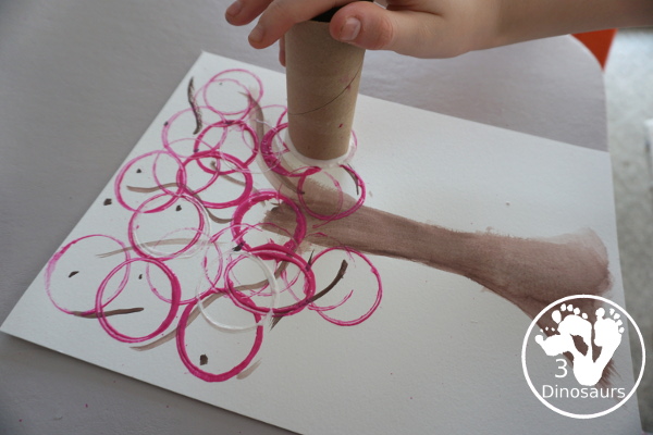 Paper Roll Painted Spring Tree is a fun spring painting with watercolor trunk and paper roll painted pink and white tree. Super easy for kids to do - 3Dinosaurs.com