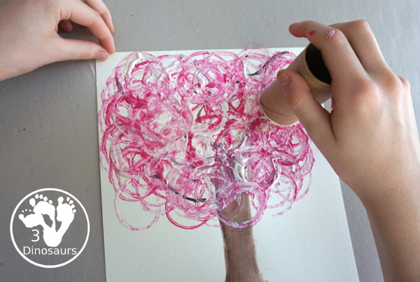 Paper Roll Painted Spring Tree is a fun spring painting with watercolor trunk and paper roll painted pink and white tree. Super easy for kids to do - 3Dinosaurs.com