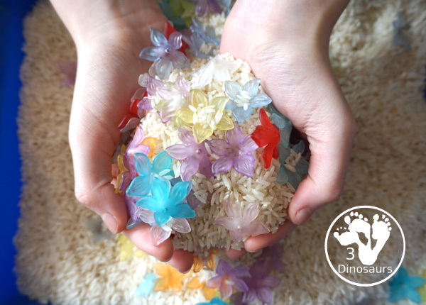 Flower & Rice Sensory Bin - have fun playing in the sensory bin - 3Dinosaurs.com