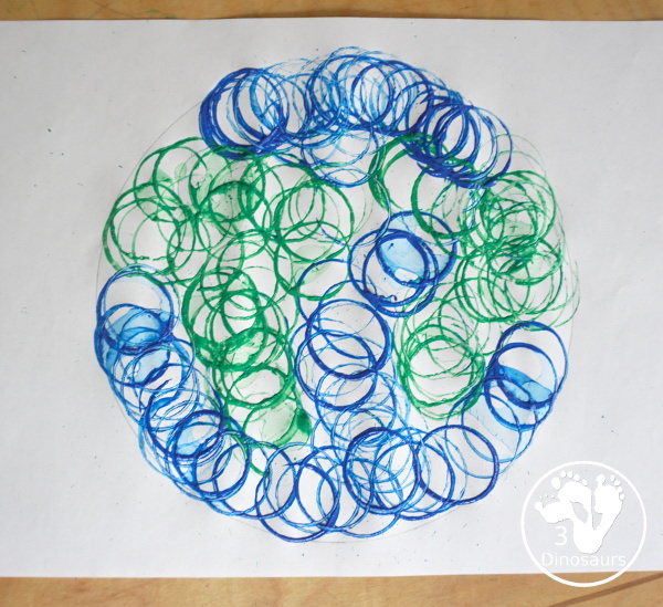 Paper Roll Painted Earth for Earth Day - fun process art projects that kids can do with paper rolls - 3Dinosaurs.com