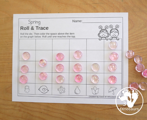 Spring Roll & Graph With Trace Letters, Numbers & Shapes with a folding die and cube die with a graphing sheet, graphing with tracing numbers, graphing with tracing letters and graphing with tracing shapes. All with a fun spring theme for prek and kindergarten - 3Dinosaurs.com