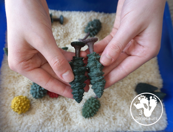 Tree & Rice Sensory Bin - a simple tree sensory bin with trees and rice for Arbor Day or Earth Day or any tree theme - 3Dinosaurs.com