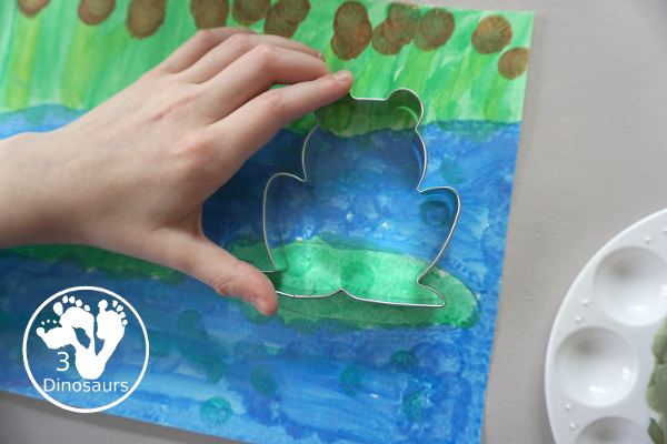 Frog Cookie Cutter Painting - a fun q-tip and dot marker pond painting that is super fun for kids to do - 3Dinosaurs.com