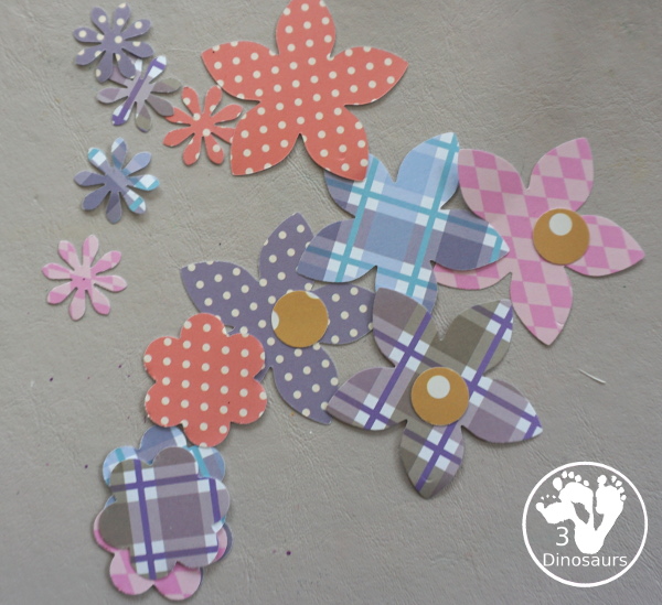 Flower Scrapbook Paper Wreath Craft - a paper plate wreath made with dot markers and scrapbook paper to make this flower wreath - 3Dinosaurs.com