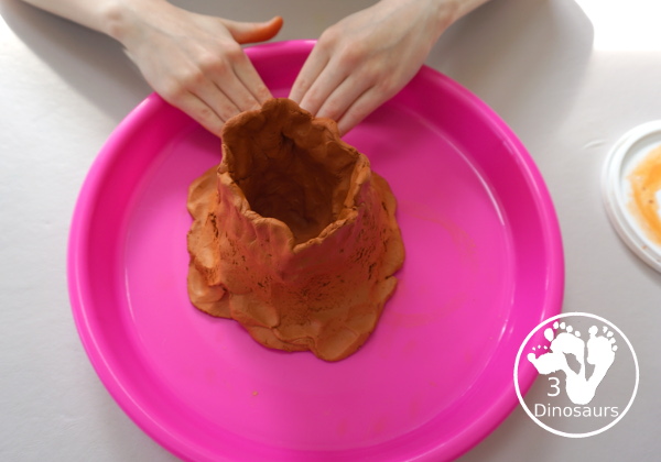 Building a Volcano with Vacation Under The Volcano - a fun science activity for kids to do with the Magic Tree House Book Vacation Under the Volcano - 3Dinosaurs.com