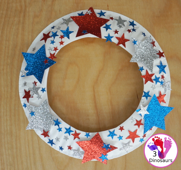 Red White & Blue Star Paper Plate Wreath for Kids - This is great for the 4th of July, Flag Day or a red white and blue theme and is super easy to make - 3Dinosaurs.com